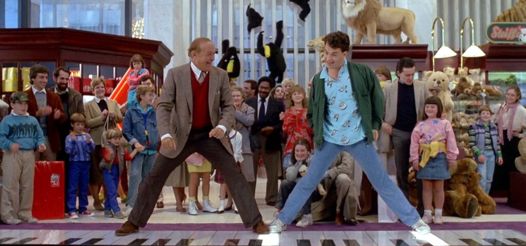Tom Hanks and Robert Loggia playing piano on the floor at FAO Schwarz in Big (1988)